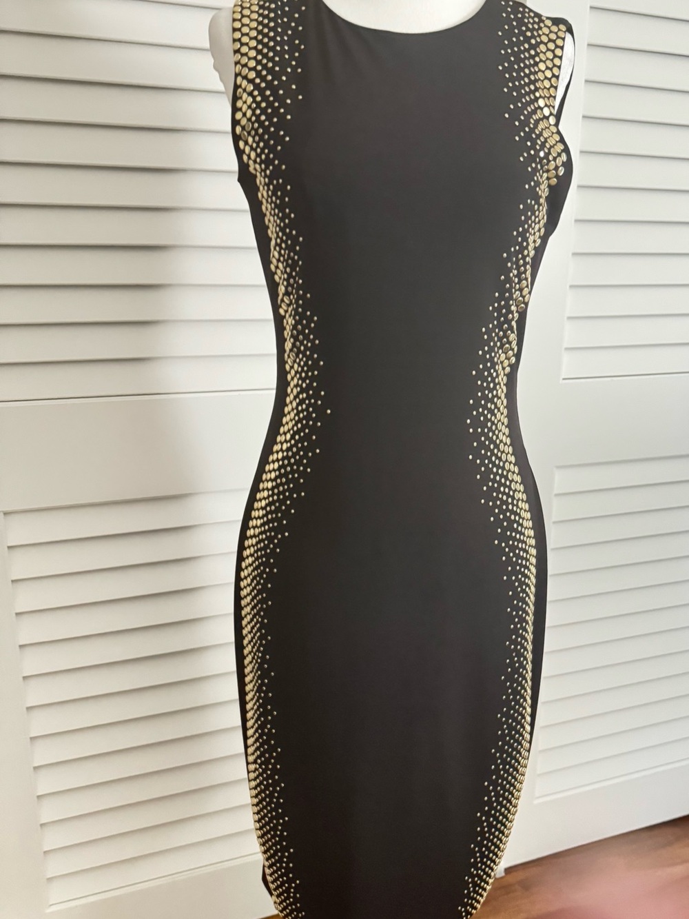 Calvin Klein Sleeveless Black Bodycon Dress with Gold Dot Accents
Size 4-NWT
